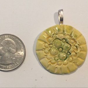 Aromatherapy clay fired pendant